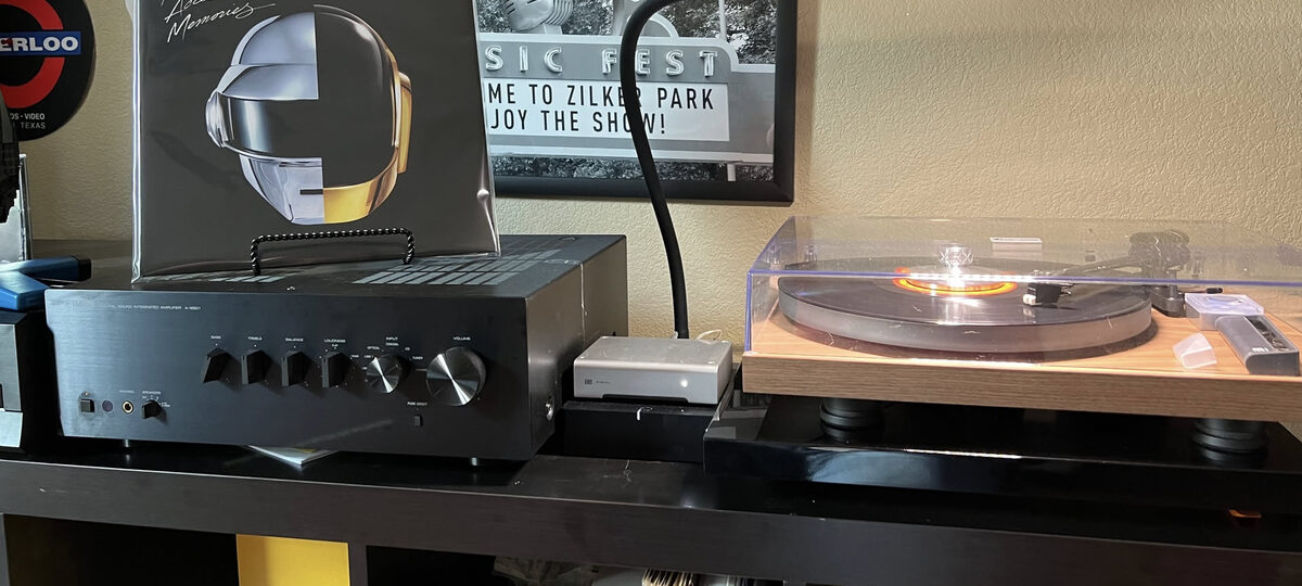 My listening setup: integrated amplifier, turntable and a Daft Punk record